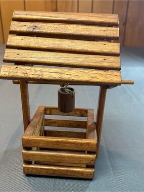 Wooden rustic Wishing Well planter or decor piece, bucket raises & lowers.